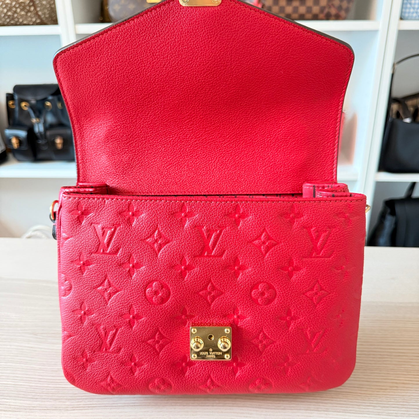 Louis Vuitton Monogram Pochette Metis Empreinte Leather Red