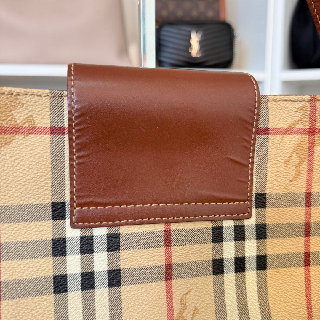 Luxe Vault Burberry House Check medium tote bag featuring iconic beige plaid canvas and dark brown leather trim.