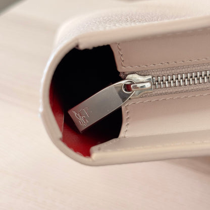 Luxe Vault Christian Louboutin Cabata North South tote in milk white leather with silver zipper and red interior