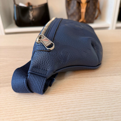 Luxe Vault Gucci blue jumbo GG embossed leather belt bag with silver hardware and adjustable strap