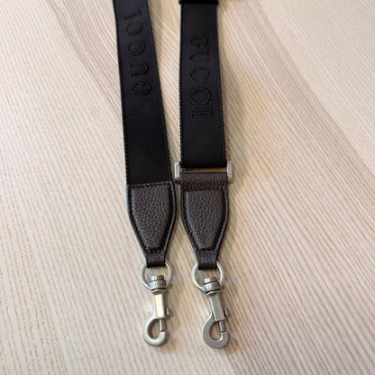 Luxe Vault Gucci black nylon crossbody bag strap with brown leather trim and silver metal hardware clips
