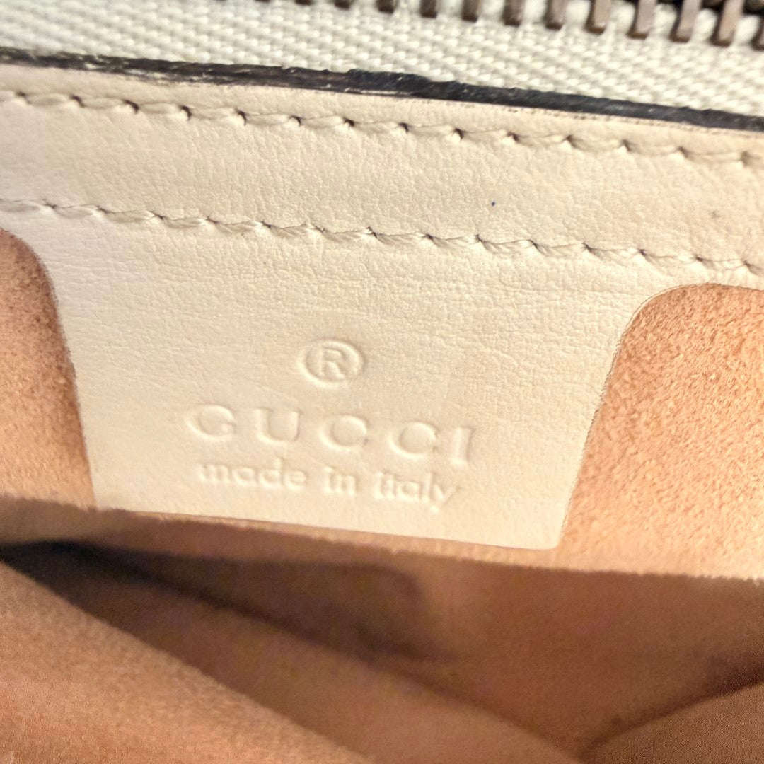 Luxe Vault Gucci GG Marmont white calfskin leather interior brand stamp and stitching detail