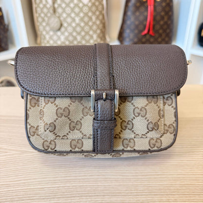 Luxe Vault Gucci monogram canvas and brown leather mini crossbody bag with a front buckle closure