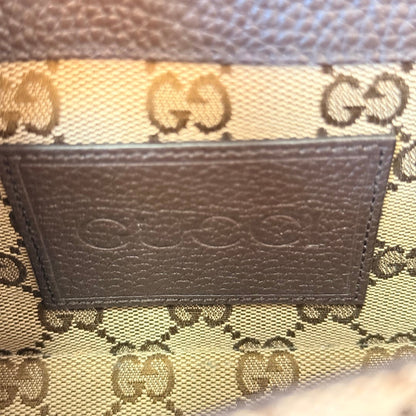 Luxe Vault Gucci monogram canvas interior with brown leather embossed logo patch