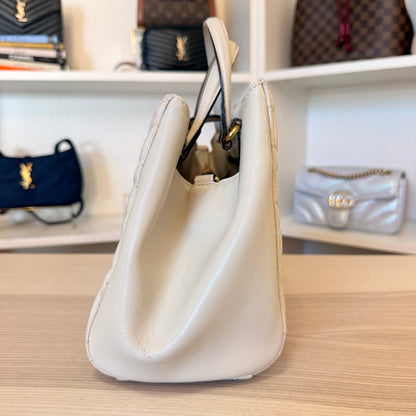 Luxe Vault white Gucci GG Marmont matelasse calfskin leather tote bag side view