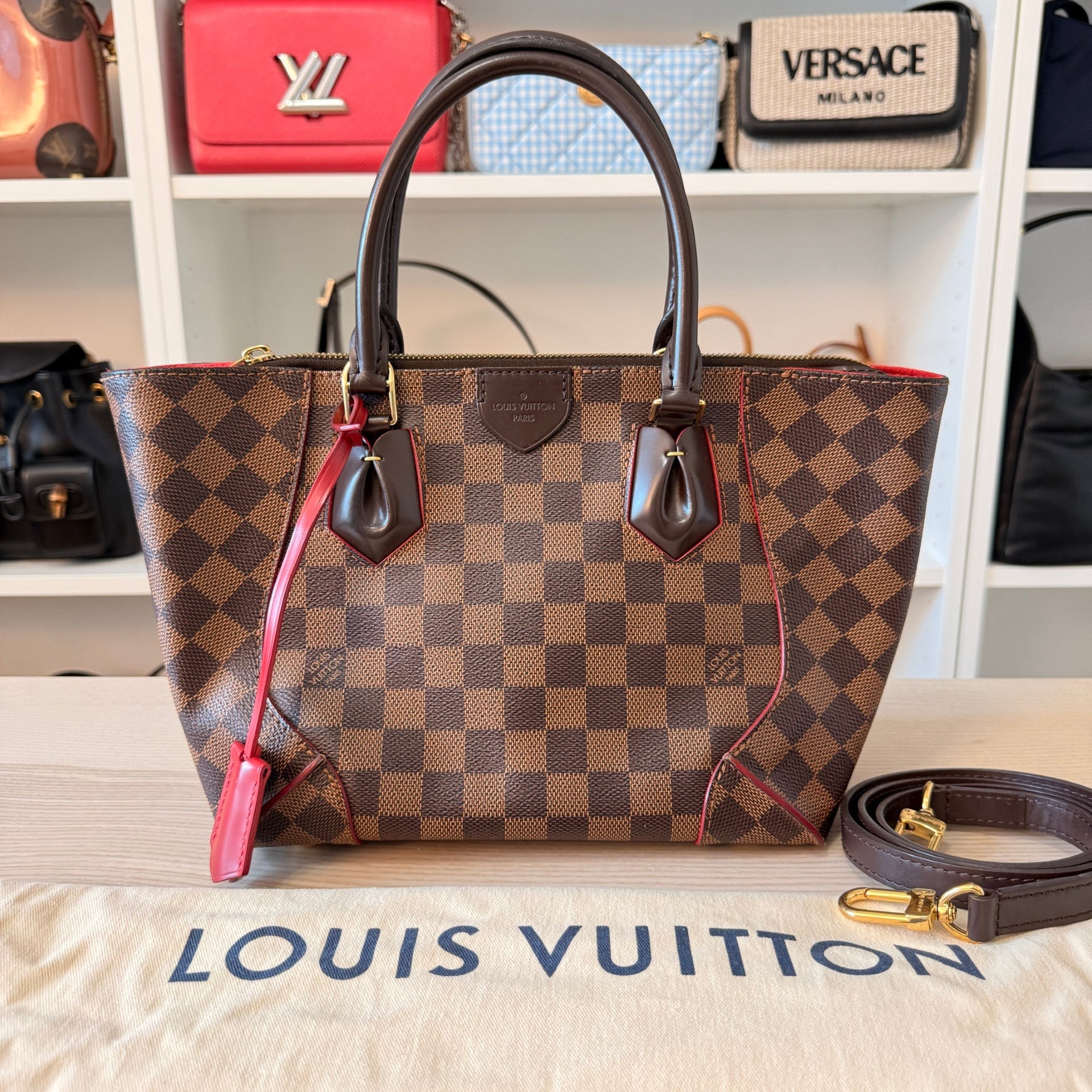 Luxe Vault Louis Vuitton Caissa PM handbag in Damier Ebene canvas with red trim and removable leather shoulder strap