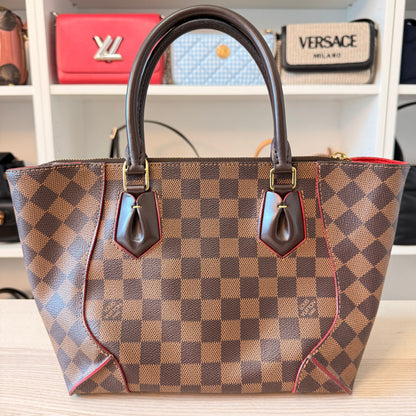 Luxe Vault pre-owned Louis Vuitton Caissa PM handbag in Damier Ebene canvas with brown leather trim and red piping.
