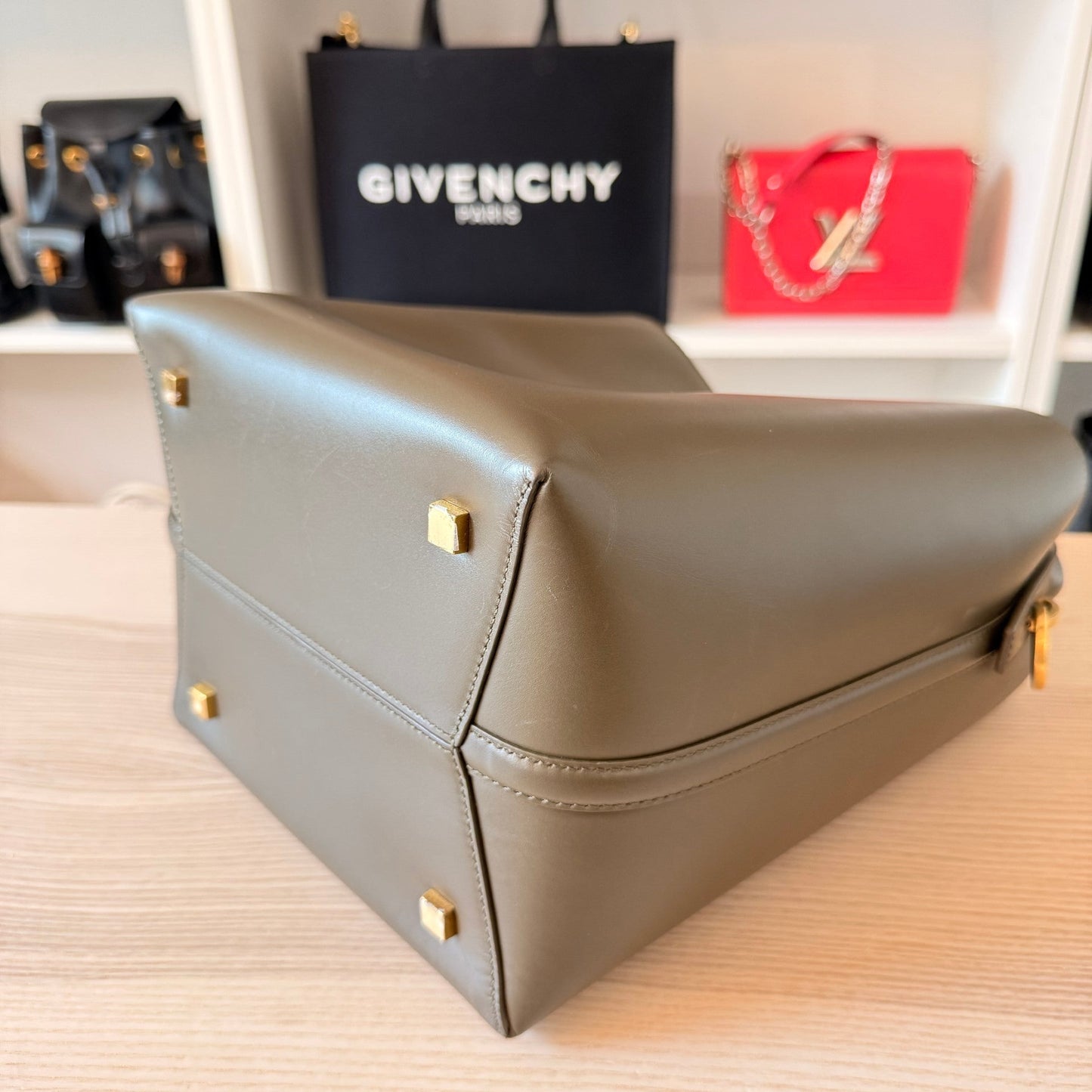 Luxe Vault Saint Laurent Le 37 bucket bag in deep musk shiny calfskin leather with gold-tone protective base studs