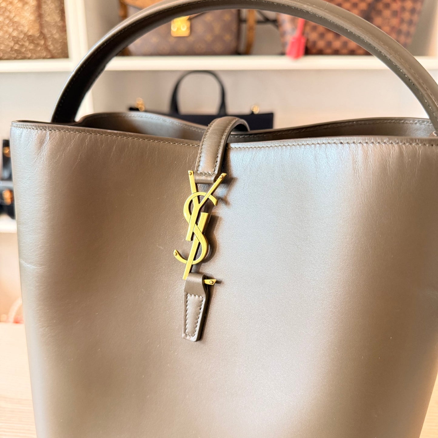 Luxe Vault Saint Laurent Le 37 bucket bag in deep musk shiny calfskin with gold-tone YSL logo hardware