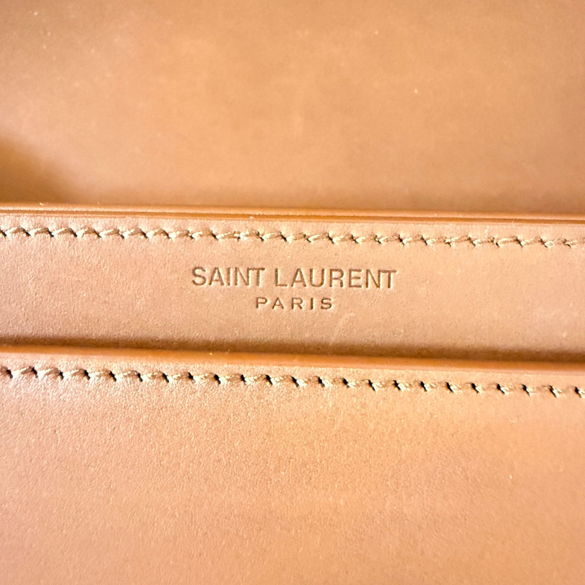 Luxe Vault Saint Laurent Paris logo embossed on brown leather Voltaire shoulder bag interior
