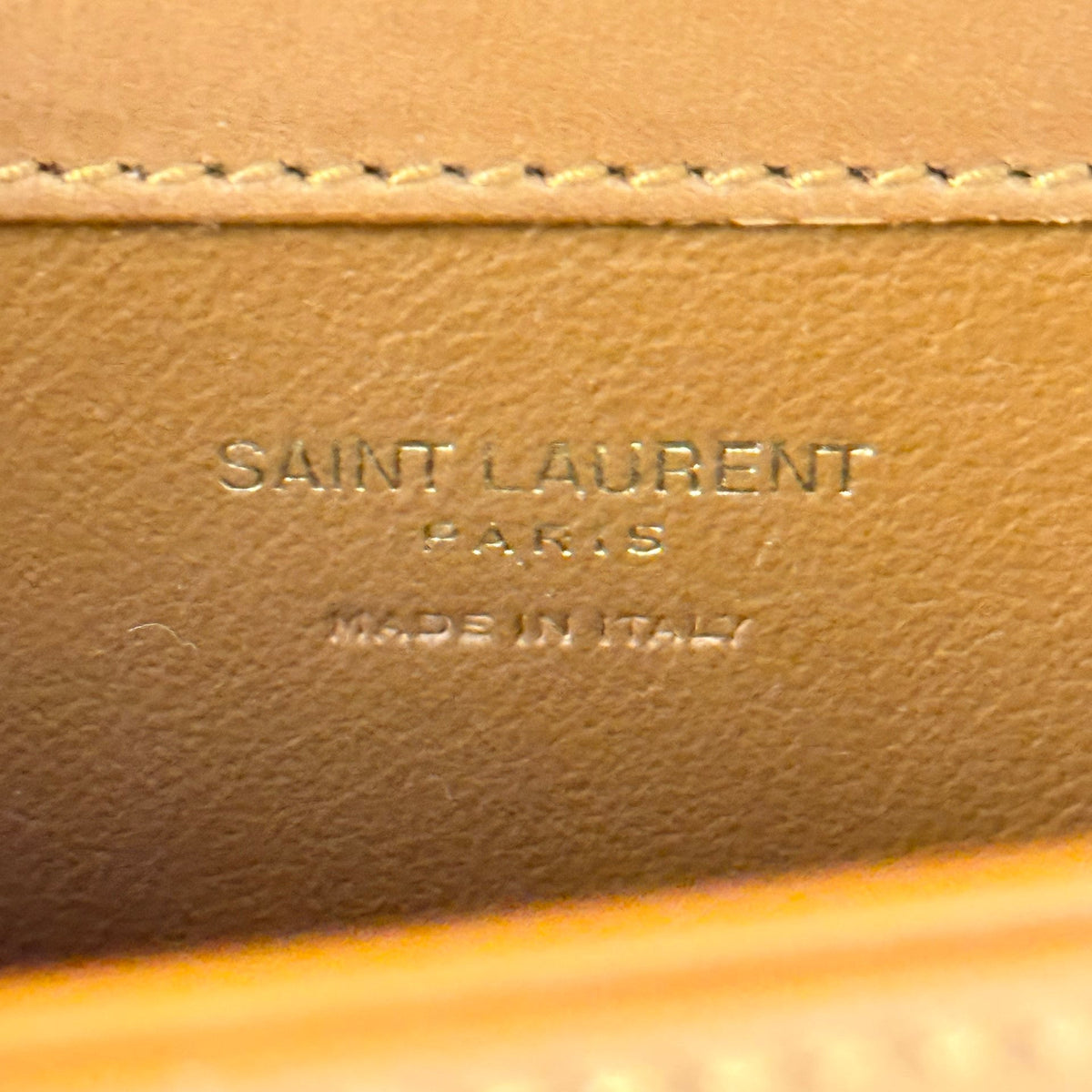 Luxe Vault Saint Laurent Voltaire bag interior leather stamp showing Saint Laurent Paris Made in Italy branding